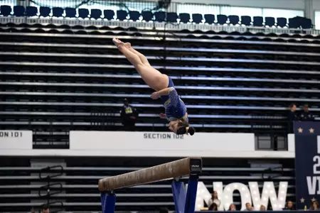 Hannah Cohen competes on balance beam.