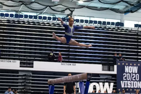 Deja Chambliss competes on balance beam.