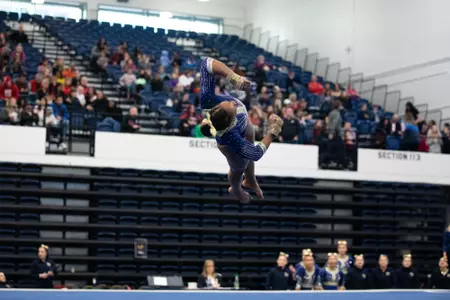 Deja Chambliss competes on floor.