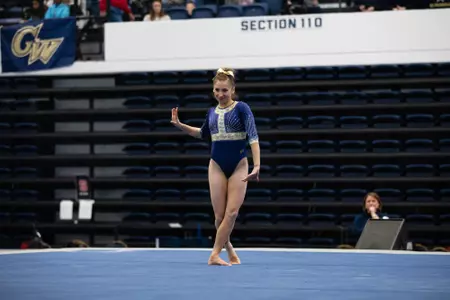 Olivia Zona competes on floor.