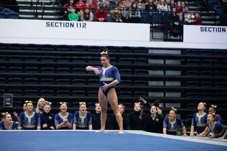 Cydney crasa competes on floor.