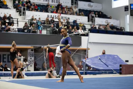 Deja Chambliss competes on floor.