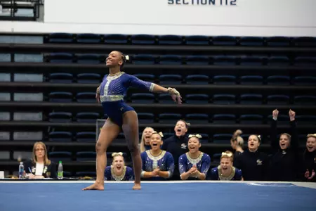 Deja Chambliss competes on floor.