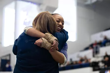 Deja Chambliss celebrates with coach.