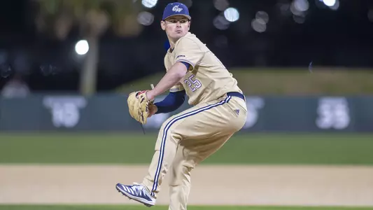 Harrison Cohen throws a pitch.