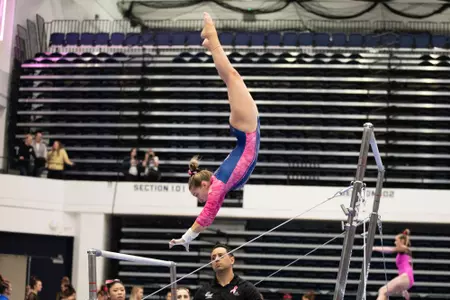 Simone Banen competes on bars.
