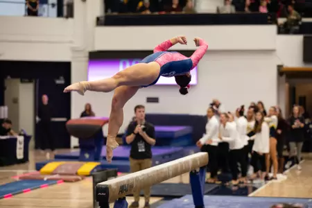Cydney Crasa competes on beam.