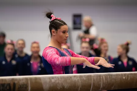 Cydney Crasa competes on beam.