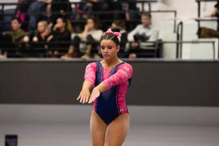 Cydney Crasa competes on beam.
