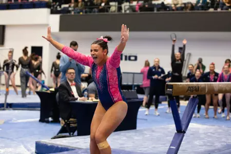 Cydney Crasa competes on beam.