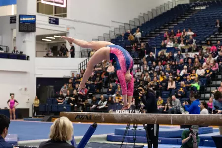 Hannah Cohen competes on balance beam.