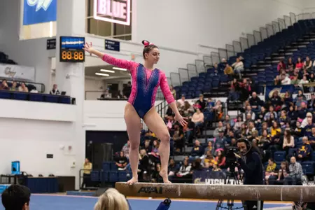 Hannah Cohen competes on balance beam.