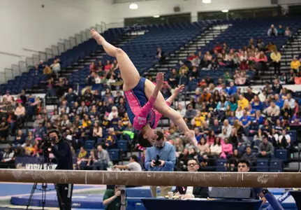Hannah Cohen competes on balance beam.