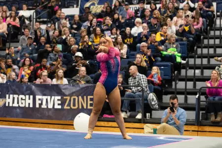 Rachel Kaplan competes on floor.