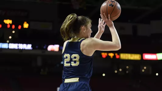 Faith Blethen rises to shoot a three-pointer.