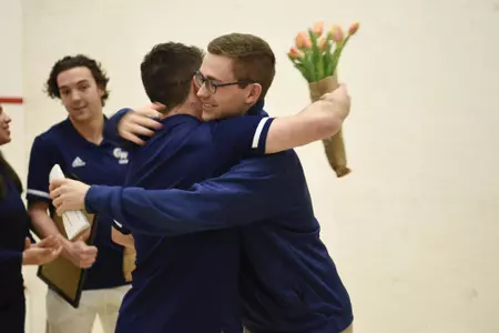 Jamie Oakley and Head Coach Anderson Good during senior game celebration.