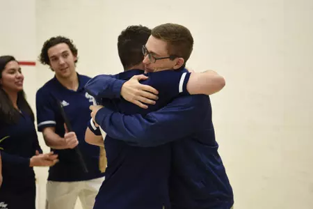 Jamie Oakley and Head Coach Anderson Good during senior game celebration.