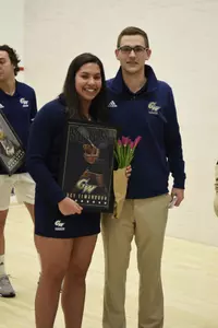 Engy Elmandouh and Head Coach Anderson Good during senior game celebration.