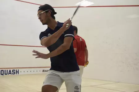 Laguna hits the ball.