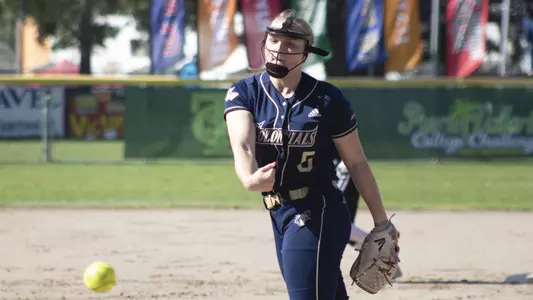 Megan Osterhaus pitches at the Puerto Vallarta College Challenge.