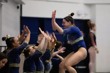 Hannah Cohen high fives teammates