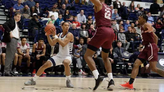 Armel Potter goes up against a Fordham defender