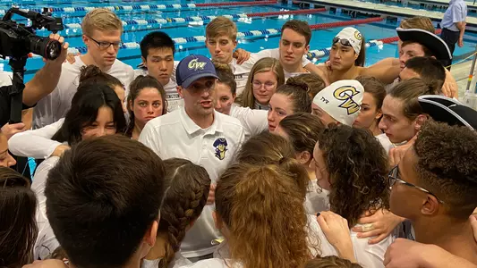 Head Coach Brian Thomas gathers his team before the third day of the 2020 A-10 Championships.