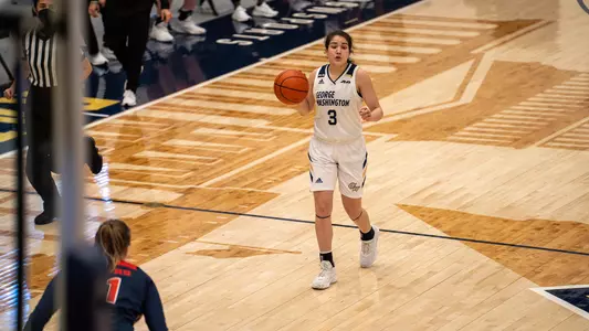 Aurea Gingras dribbles it up the court.