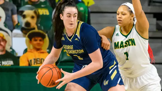 Ali Brigham backs down her defender.