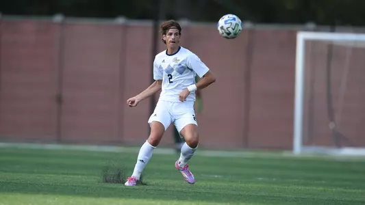 Christian Rader sends a pass vs. Saint Joseph's.