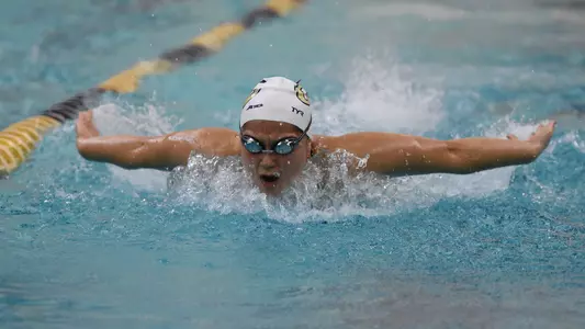 Carly Perri swims the 100 fly vs. Virginia Tech.