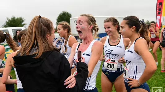 Kathryn Nohilly Celebrates GWXC's A-10 title