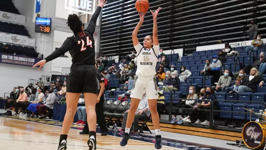 Taylor Webster shoots a three point shot against Virginia Tech