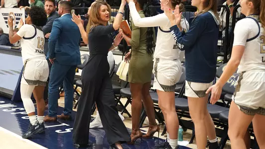 Coach McCombs Coaching During Game against American