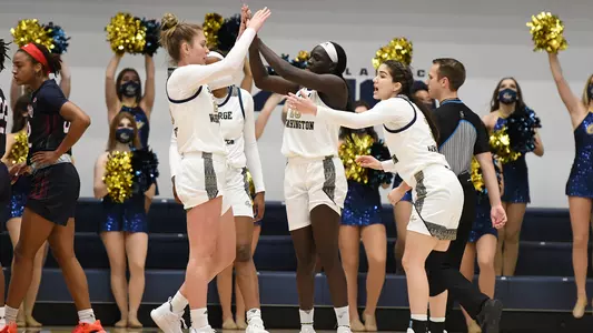 Women's basketball celebrates against Howard