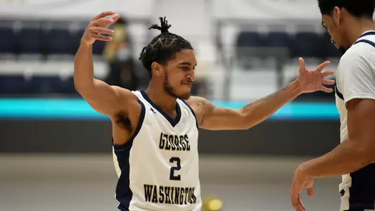 Brayon Freeman celebrates with Ricky Lindo vs. Coppin State.