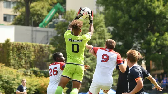 Justin Grady leaps to make a save.