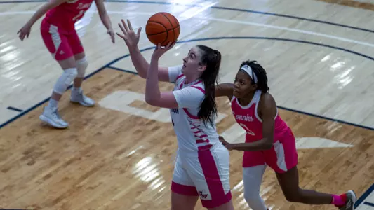 Ali Brigham goes in for a layup