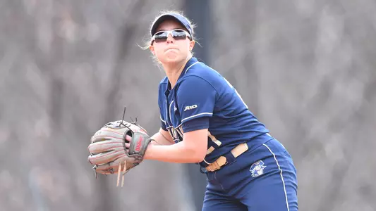 Hannah Eslick makes a throw to first base.