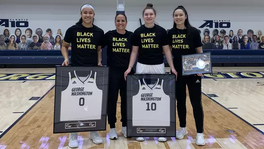 Women's basketball seniors pose on Senior Day