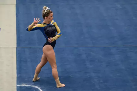 Kendall Whitman performs on floor
