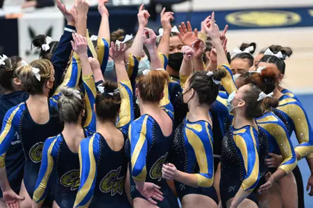 Gymnastics team huddle