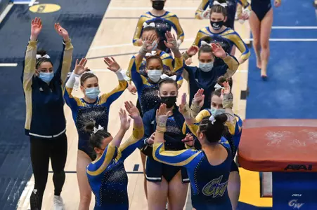 Gymnastics celebrates after vault performance