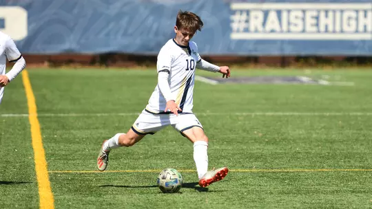 Tom Cooklin lines up a kick vs. Davidson.