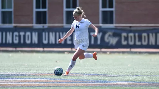 Isabelle Eskay kicks to teammate from midfield