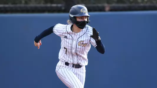Darbie Stancil runs to first base.