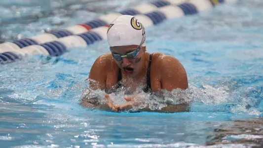 Andrea Moussier swims the breaststroke.