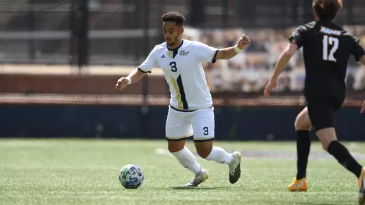 Ryan Cedeno dribbles down field vs. VCU.