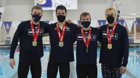 Dylan Arzoni, Josh Legge, Marek Osina and Emils Pone pose with their gold medals.