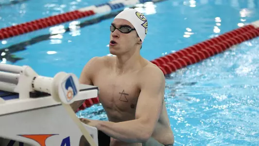 Karol Mlynarczyk gets ready to swim backstroke.